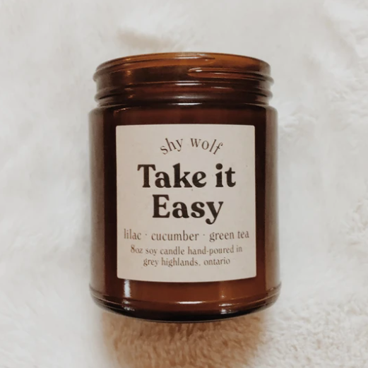 Shy Wolf 'take it easy' candle in an amber glass jar